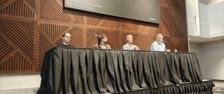 Image of Speakers at Panel Discussion